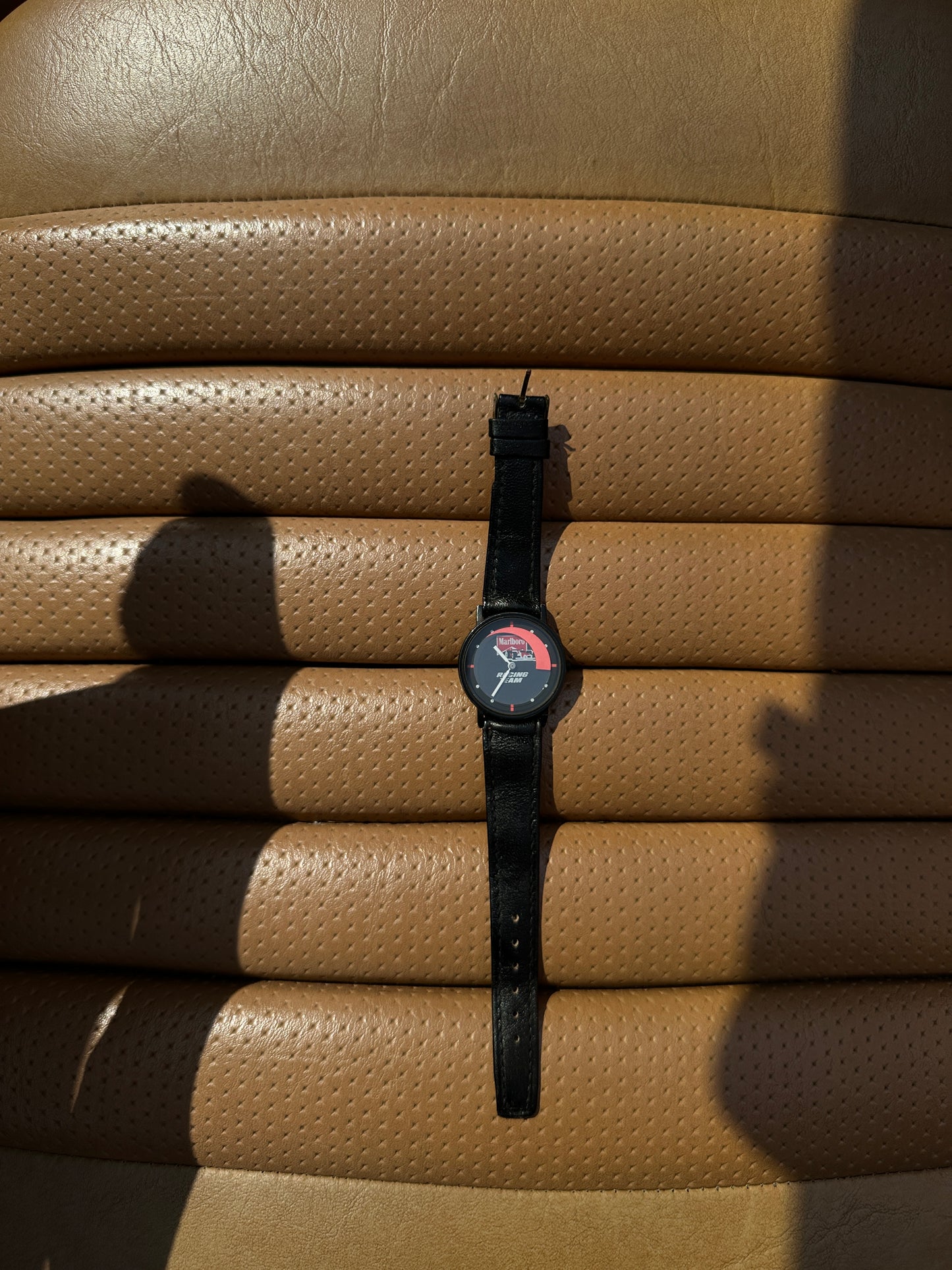 Marlboro Black Racing Team Throttle Design Watch - Genuine Design Luxury Consignment. New & Pre-Owned Clothing, Shoes, & Accessories. Calgary, Canada