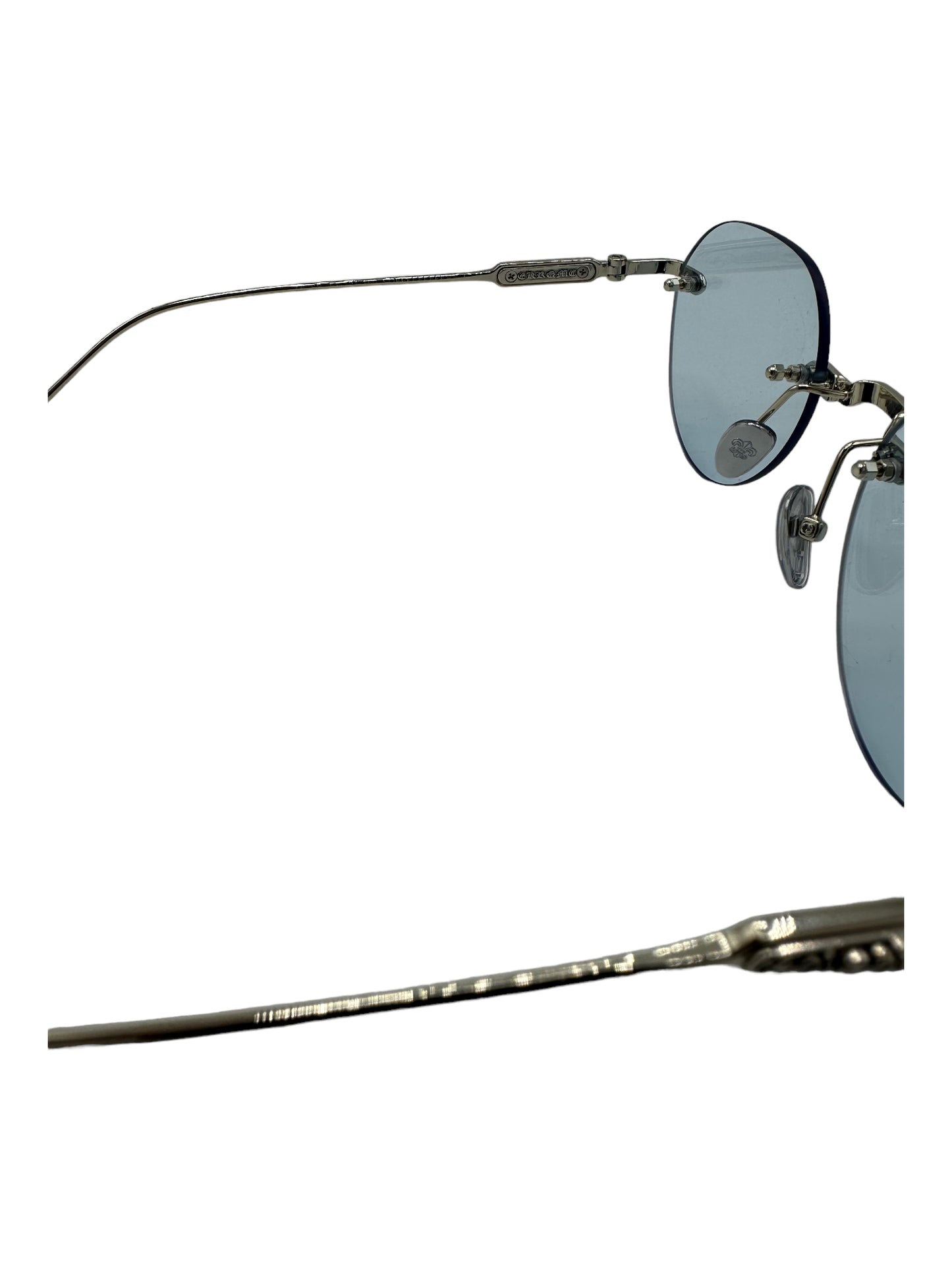 Chrome Hearts Blue Lens Rimless Sunglasses - Genuine Design Luxury Consignment for Men. New & Pre-Owned Clothing, Shoes, & Accessories. Calgary, Canada
