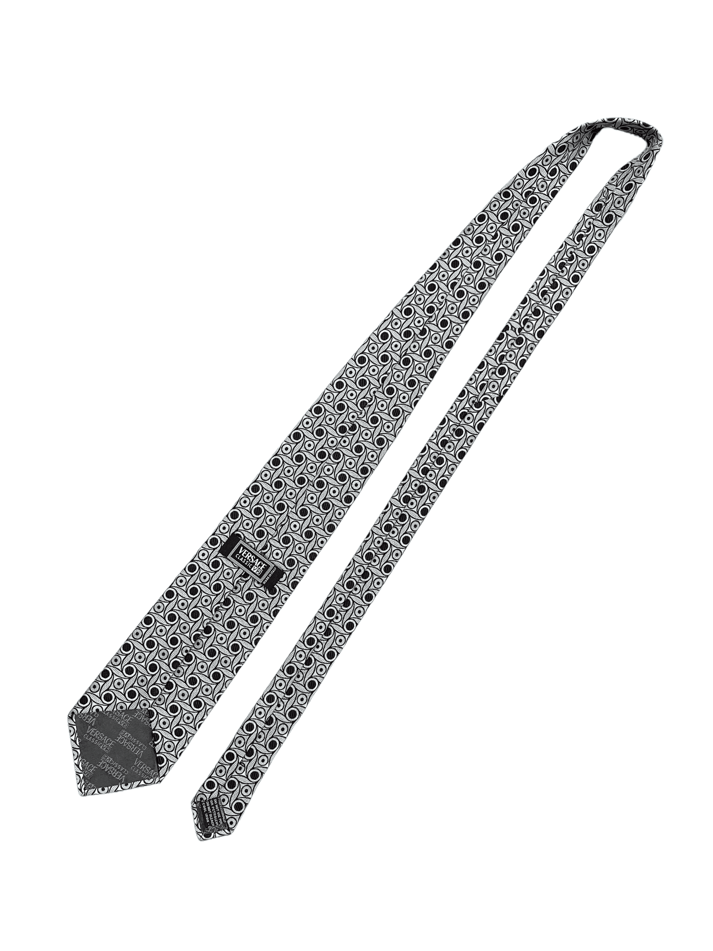 Versace Silver Black Geometric Silk Tie — Genuine Design Luxury Consignment for Men. New & Pre-Owned Clothing, Shoes, & Accessories. Calgary, Canada