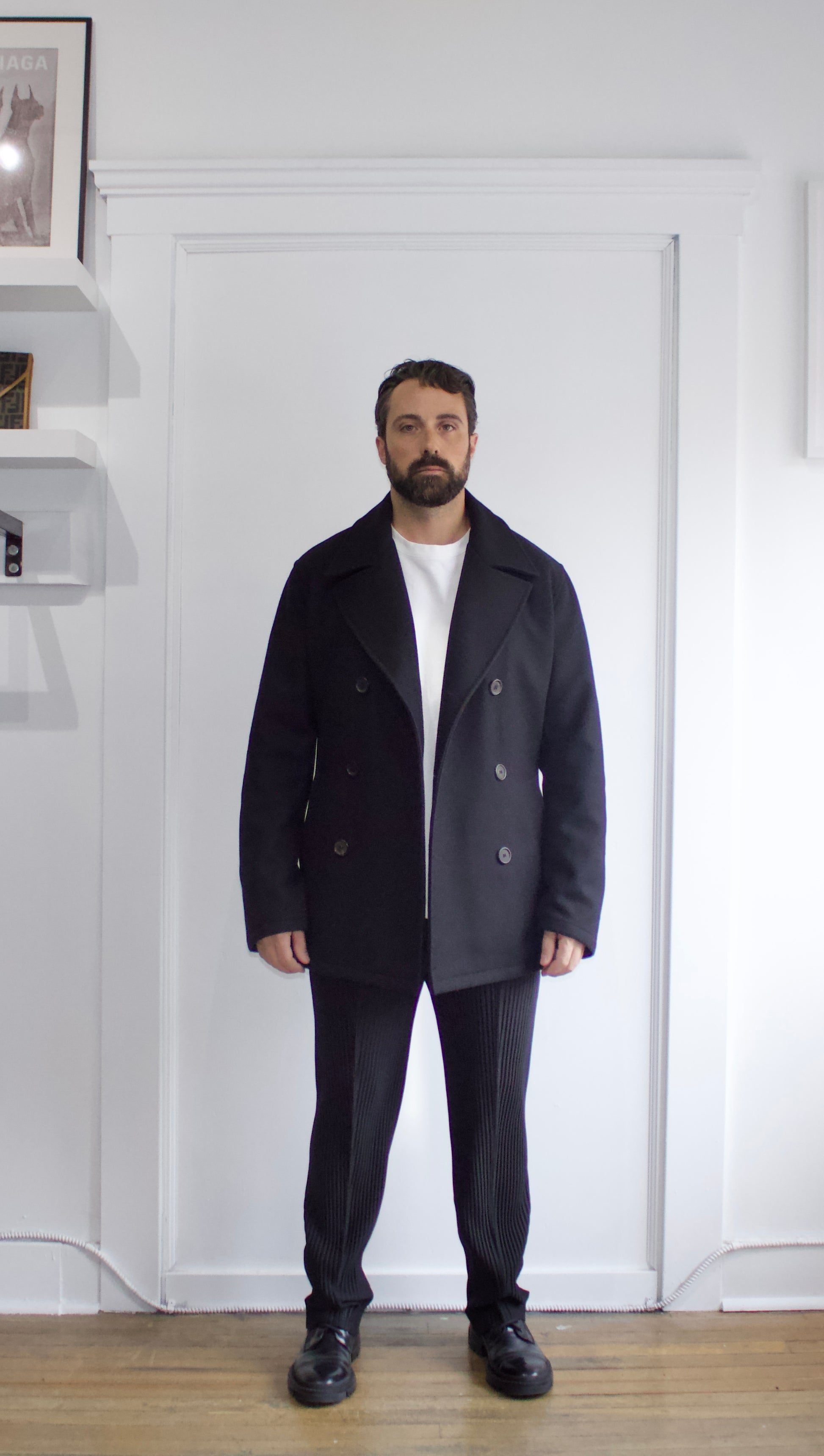 Prada Black Wool Three-Quarter Length Coat - Genuine Design Luxury Consignment. New & Pre-Owned Clothing, Shoes, & Accessories. Calgary, Canada
