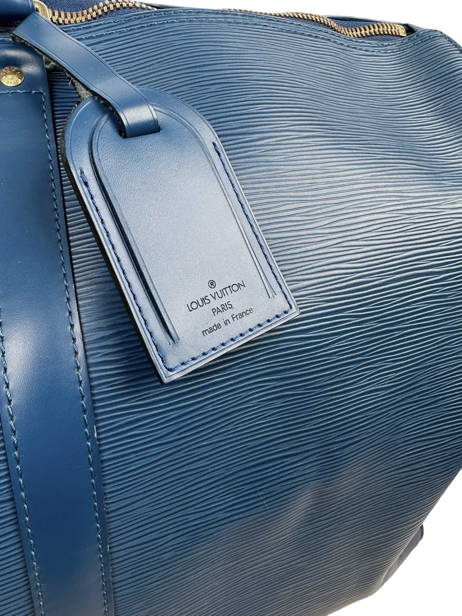 Louis Vuitton Blue épi Leather Keepall 50L Travel Bag — Genuine Design Luxury Consignment for Men. New & Pre-Owned Clothing, Shoes, & Accessories. Calgary, Canada