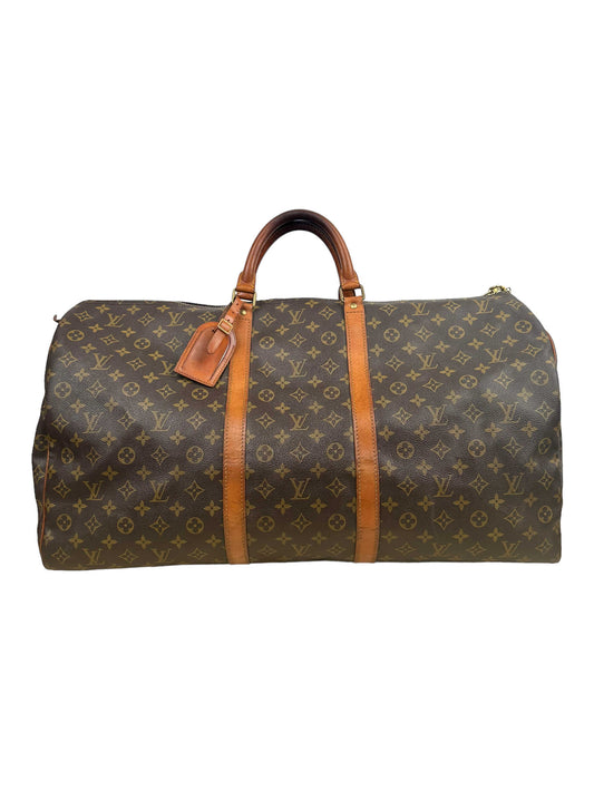 Louis Vuitton Brown Monogramed Leather Keepall 50L Travel Bag — Genuine Design Luxury Consignment for Men. New & Pre-Owned Clothing, Shoes, & Accessories. Calgary, Canada