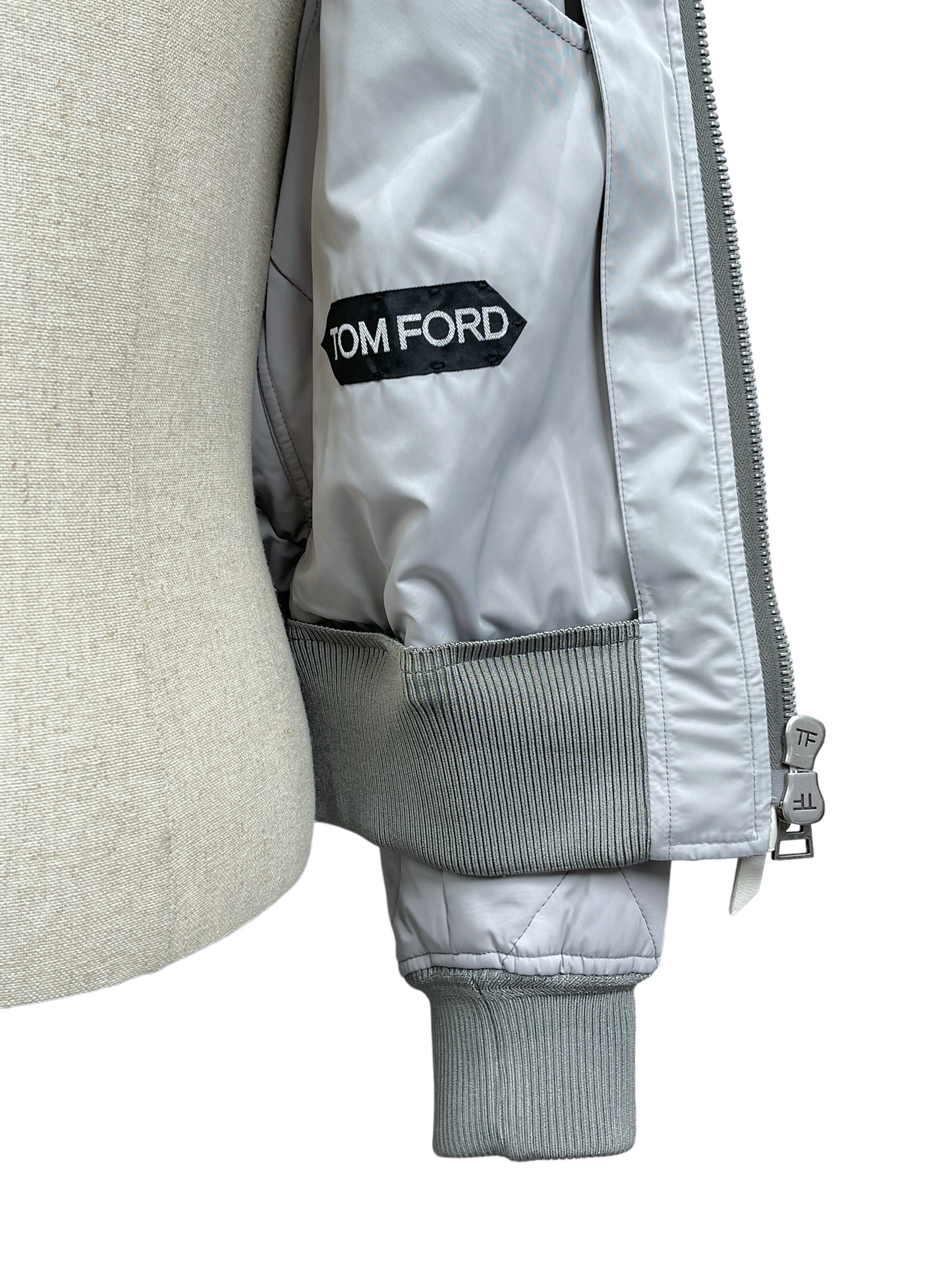 Tom Ford Light Grey Quilted Bomber Jacket 36— Genuine Design Luxury Consignment Calgary, Alberta, Canada New and Pre-Owned Clothing, Shoes, Accessories.