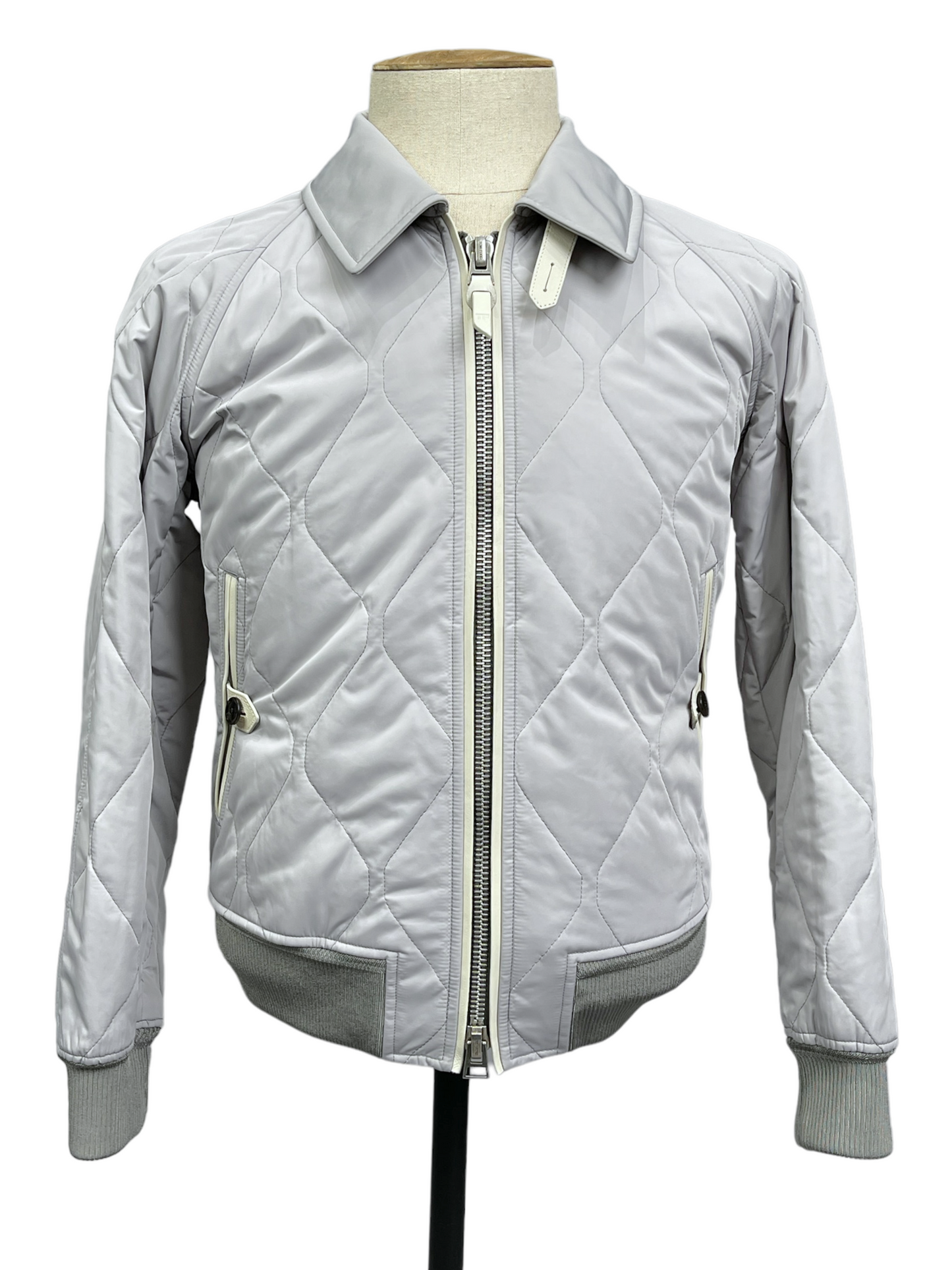 Tom Ford Light Grey Quilted Bomber Jacket 36— Genuine Design Luxury Consignment Calgary, Alberta, Canada New and Pre-Owned Clothing, Shoes, Accessories.