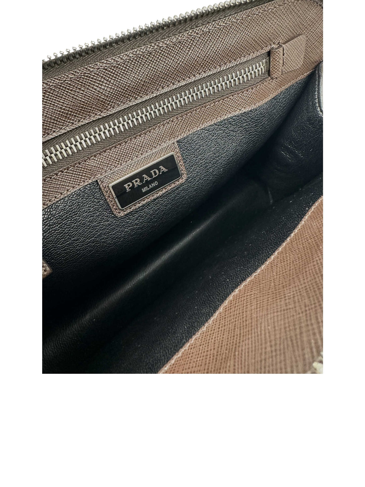 Prada Dark Brown Leather Clutch with Wrist Strap — Genuine Design Luxury Consignment for Men. New & Pre-Owned Clothing, Shoes, & Accessories. Calgary, Canada