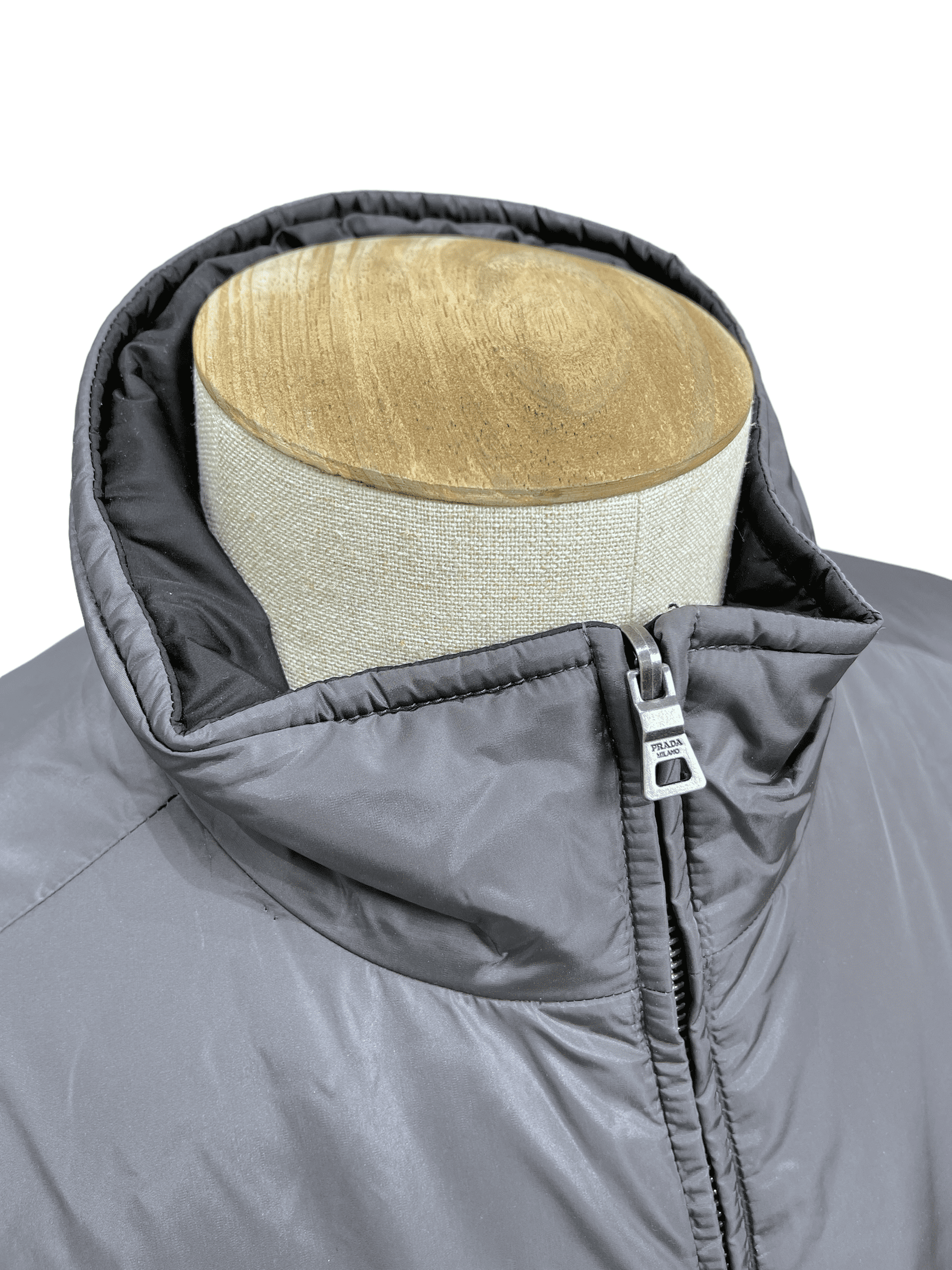 Prada Luna Rosa Reversible Puffer Jacket - Genuine Design Luxury Consignment for Men. New & Pre-Owned Clothing, Shoes, & Accessories. Calgary, Canada